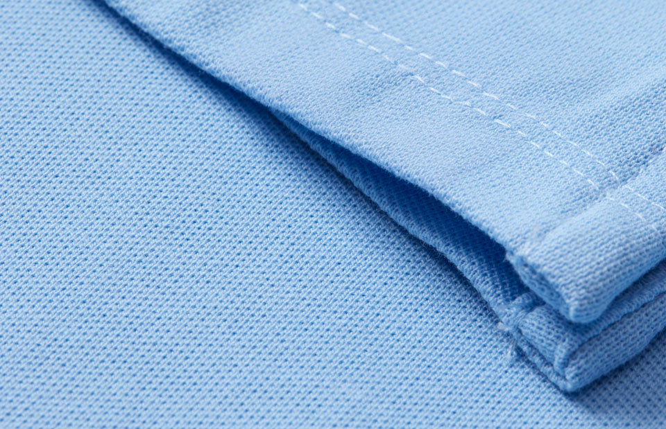 ID 0374 PRO Wear CARE poloshirt nærbillede til broderi