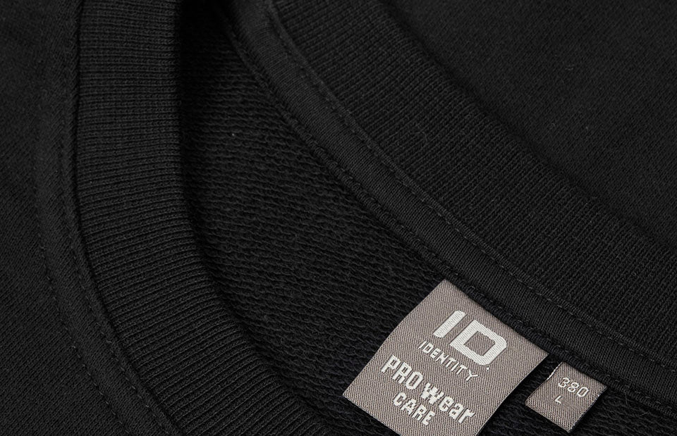 ID 0380 PRO Wear CARE sweatshirt | ubørstet nærbillede med logo