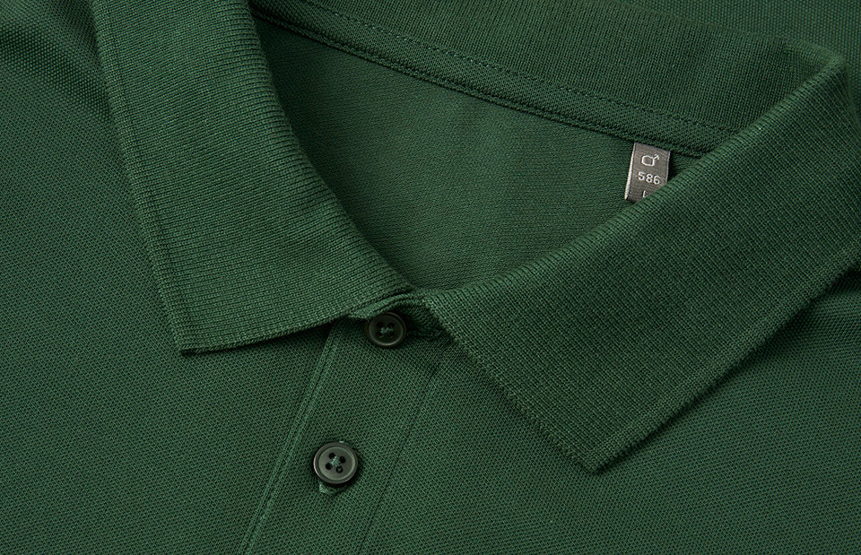 ID 0586 Poloshirt | økologisk detalje med logo