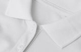 ID 0587 Poloshirt | økologisk | dame detalje til broderi